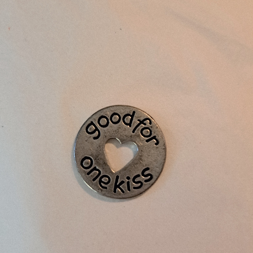 Kiss Silver Token with Heart Cutout